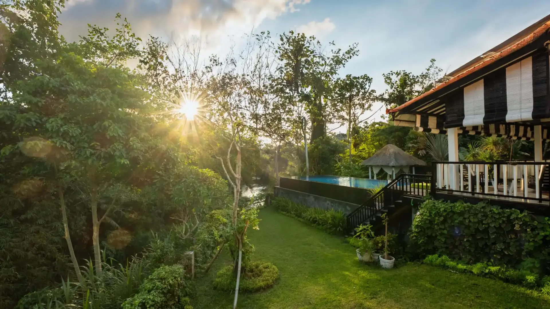 Villa roofs at sunset in Bali