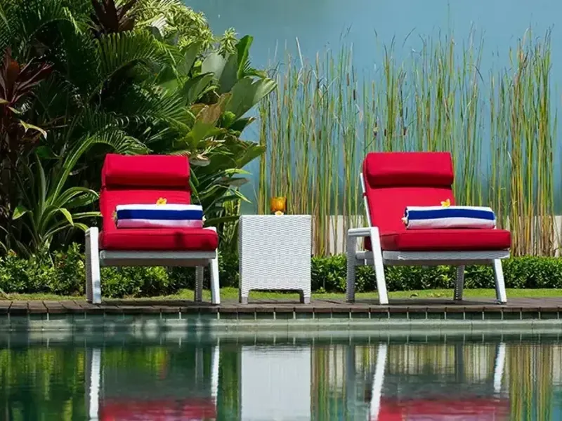 Outdoor seating beside rice fields in Bali